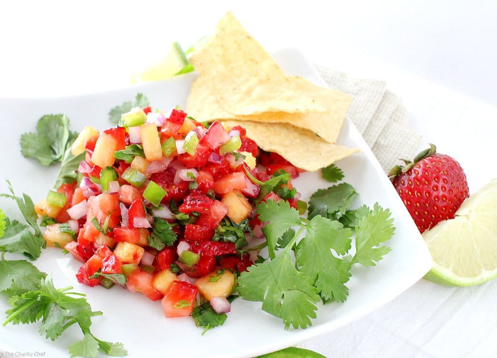 The Chunky Chef | Strawberry Jalapeno and Pineapple Salsa: Fresh, summery, and tasty!  This strawberry jalapeno and pineapple salsa is perfect with crisp tortilla chips, or as a topper for some grilled chicken.