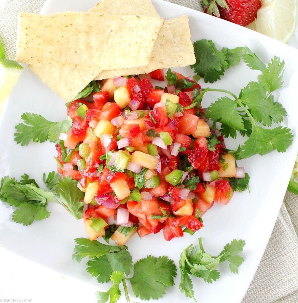 The Chunky Chef | Strawberry Jalapeno and Pineapple Salsa: Fresh, summery, and tasty!  This strawberry jalapeno and pineapple salsa is perfect with crisp tortilla chips, or as a topper for some grilled chicken.