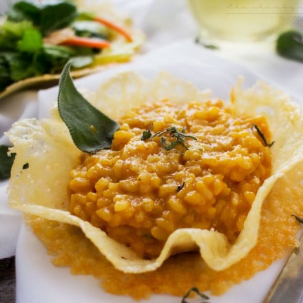 Pumpkin Risotto in Parmesan Bowls | Classic Fall flavors come together in this ultra creamy pumpkin risotto topped with fresh sage and a sprinkle of Parmesan... served in edible bowls!!