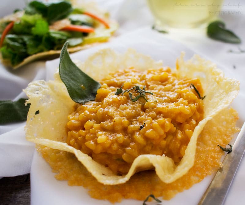 Pumpkin Risotto in Parmesan Bowls | Classic Fall flavors come together in this ultra creamy pumpkin risotto topped with fresh sage and a sprinkle of Parmesan... served in edible bowls!!