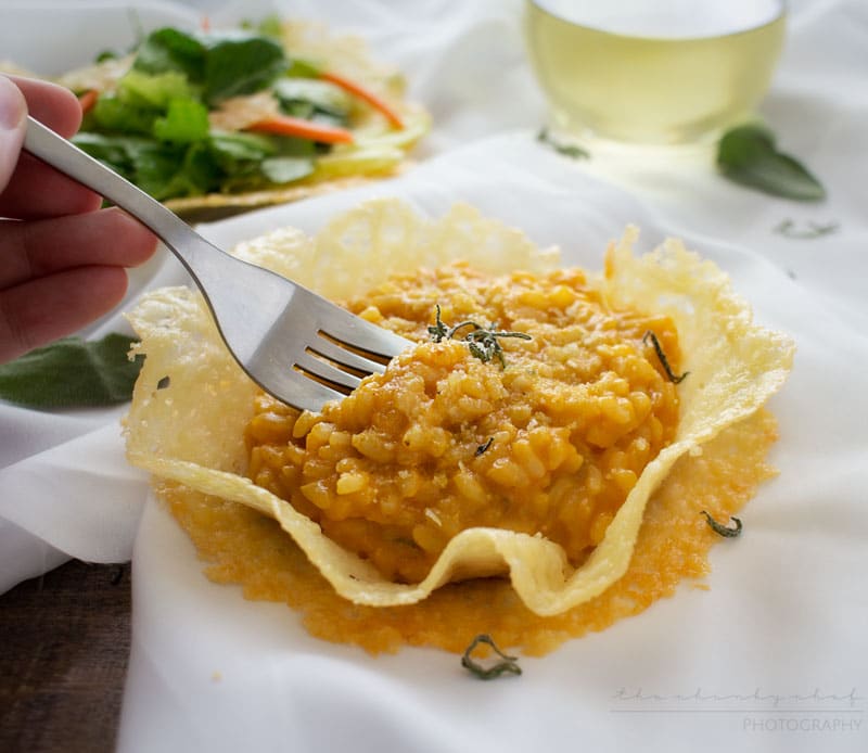 Pumpkin Risotto in Parmesan Bowls | Classic Fall flavors come together in this ultra creamy pumpkin risotto topped with fresh sage and a sprinkle of Parmesan... served in edible bowls!!