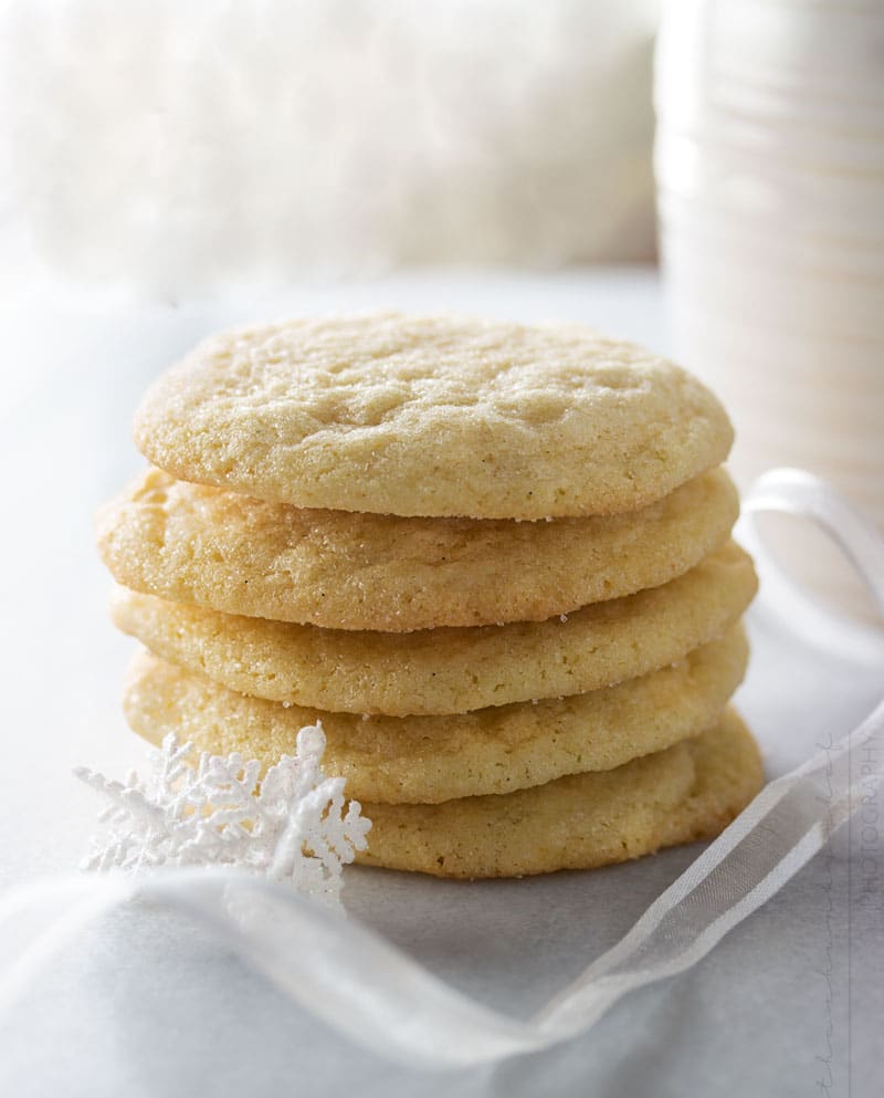 Soft Vanilla Bean Sugar Cookies | These vanilla bean sugar cookies are rolled in sugar for a sparkling appearance and a soft, light and chewy texture that will make these your new favorite!