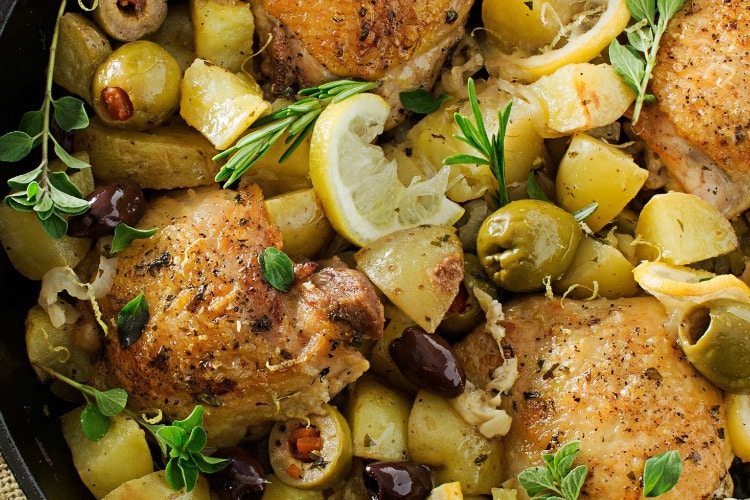 One Pan Mediterranean Braised Chicken | Fall in love with Mediterranean flavors with this easy and delicious one pan, one hour, braised chicken with creamy potatoes, roasted olives, bright lemon and fresh herbs!