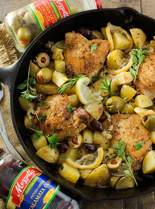 One Pan Mediterranean Braised Chicken | Fall in love with Mediterranean flavors with this easy and delicious one pan, one hour, braised chicken with creamy potatoes, roasted olives, bright lemon and fresh herbs! 