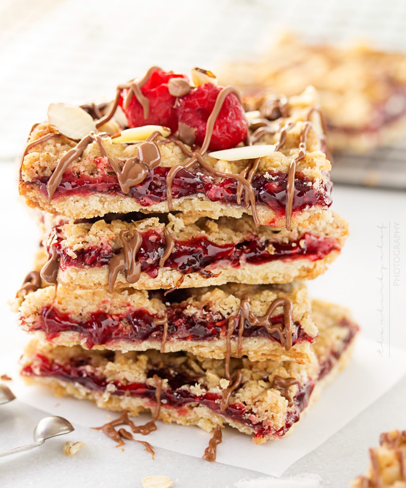 Skinny Raspberry Shortbread Bars | Buttery and sweet, these raspberry shortbread bars are definitely not short on flavor! You'll never be able to tell they're made with fewer calories!