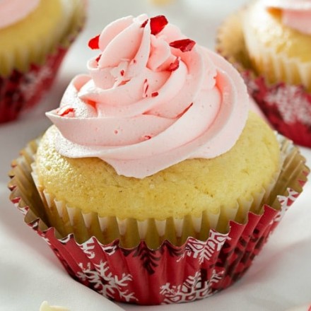 White Chocolate Cupcakes with Peppermint Buttercream | Rich white chocolate cupcakes with a delicate swirl of ultra creamy buttercream frosting laced with peppermint... perfect for any occasion!