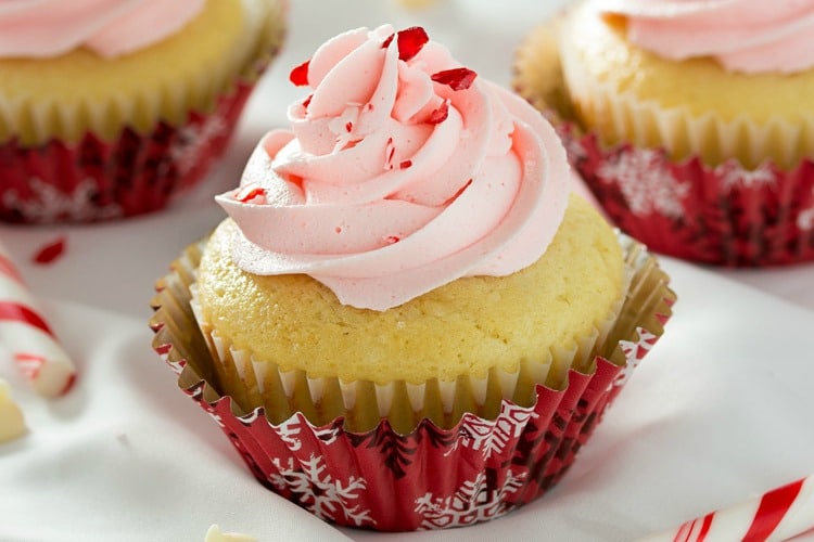 White Chocolate Cupcakes with Peppermint Buttercream | Rich white chocolate cupcakes with a delicate swirl of ultra creamy buttercream frosting laced with peppermint... perfect for any occasion!