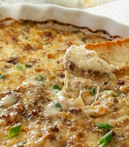 Caramelized Onion Dip | The ultimate party dip! This onion dip is made with gruyere, white cheddar, herbs, bacon, and rich caramelized onions for a melt in your mouth appetizer! | http://thechunkychef.com