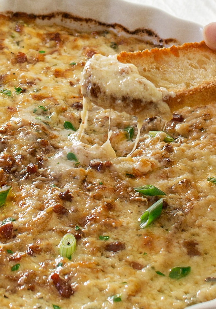 Caramelized Onion Dip | The ultimate party dip! This onion dip is made with gruyere, white cheddar, herbs, bacon, and rich caramelized onions for a melt in your mouth appetizer! | http://thechunkychef.com
