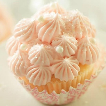 White Chocolate Pink Champagne Cupcakes | Soft, fluffy, white chocolate mini champagne cupcakes are topped with a light and creamy pink champagne buttercream frosting for the perfect treat!! | http://thechunkychef.com