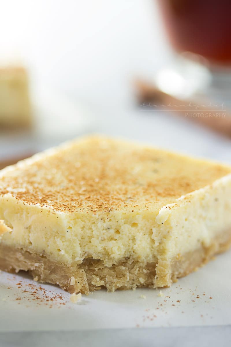 Vanilla Chai Cheesecake Bars | Love cheesecake, but don't want a whole cake? These lusciously creamy cheesecake bars are flavored with chai and vanilla bean for the perfect treat! | http://thechunkychef.com