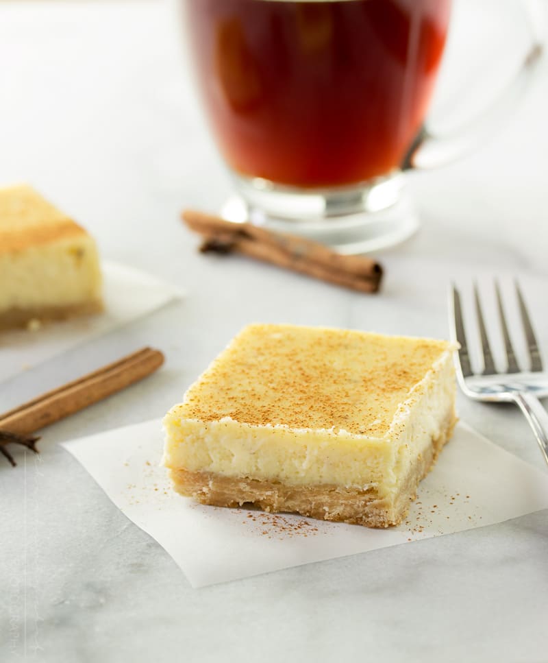 Vanilla Chai Cheesecake Bars | Love cheesecake, but don't want a whole cake? These lusciously creamy cheesecake bars are flavored with chai and vanilla bean for the perfect treat! | http://thechunkychef.com