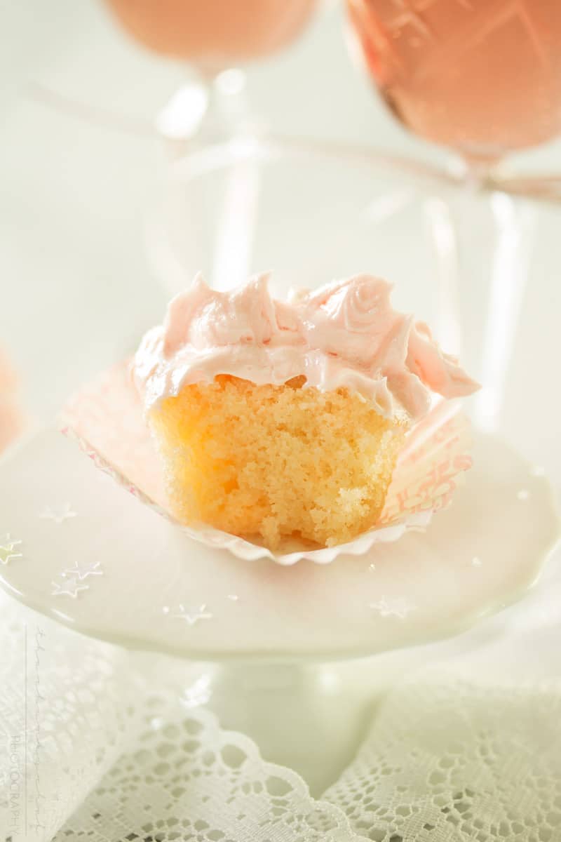 White Chocolate Pink Champagne Cupcakes | Soft, fluffy, white chocolate mini champagne cupcakes are topped with a light and creamy pink champagne buttercream frosting for the perfect treat!! | http://thechunkychef.com