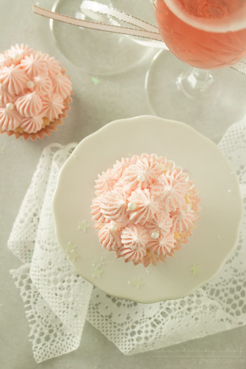 White Chocolate Pink Champagne Cupcakes | Soft, fluffy, white chocolate mini champagne cupcakes are topped with a light and creamy pink champagne buttercream frosting for the perfect treat!! | http://thechunkychef.com