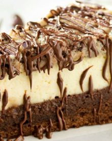 Brownie-Bottom-Cookie-Dough-Cheesecake | This impressive, yet super easy, brownie bottom cookie dough cheesecake looks as fancy as any dessert you've had from a restaurant! The ULTIMATE cheesecake for the ULTIMATE dessert lover! | http://thechunkychef.com