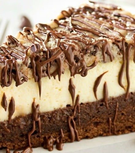 Brownie-Bottom-Cookie-Dough-Cheesecake | This impressive, yet super easy, brownie bottom cookie dough cheesecake looks as fancy as any dessert you've had from a restaurant! The ULTIMATE cheesecake for the ULTIMATE dessert lover! | http://thechunkychef.com