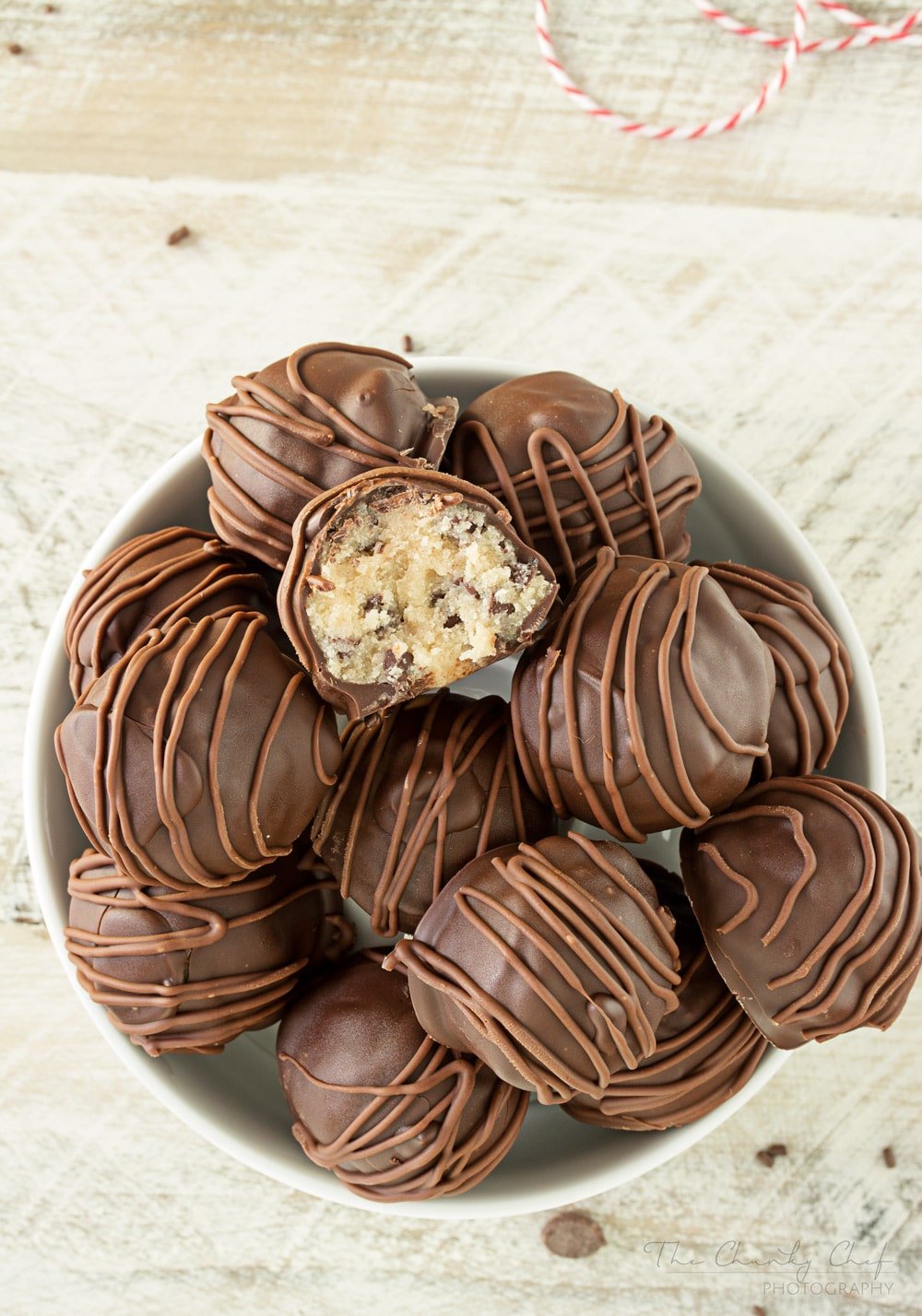 Triple-Chocolate-Cookie-Dough-Truffles | These cookie dough truffles are made from an egg-less cookie dough with semi sweet chocolate chips, then coated in two different kinds of chocolate! | http://thechunkychef.com