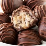 Triple Chocolate Cookie Dough Truffles | These cookie dough truffles are made from an egg-less cookie dough with semi sweet chocolate chips, then coated in two different kinds of chocolate! | http://thechunkychef.com