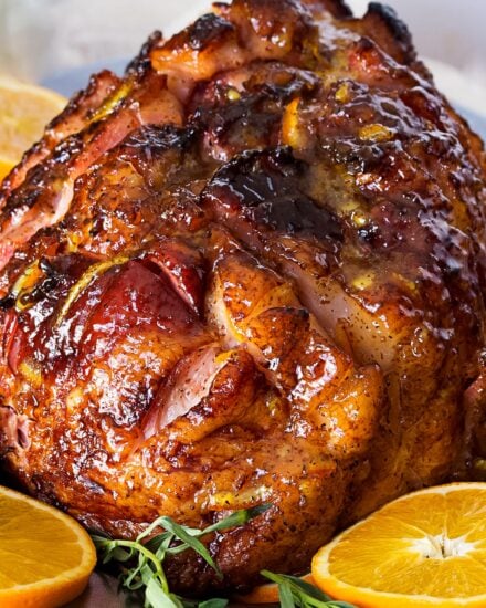 Sticky, sweet, tangy, and full of flavor... this bourbon mustard and orange glazed ham is one that you'll be happy to have as the star of your holiday meal!