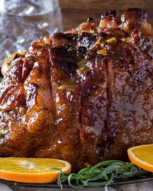 Bourbon Mustard Orange Glazed Ham | Sticky, sweet, tangy, and full of flavor... this bourbon mustard and orange glazed ham is one that you'll be happy to have as the star of your holiday meal! | http://thechunkychef.com