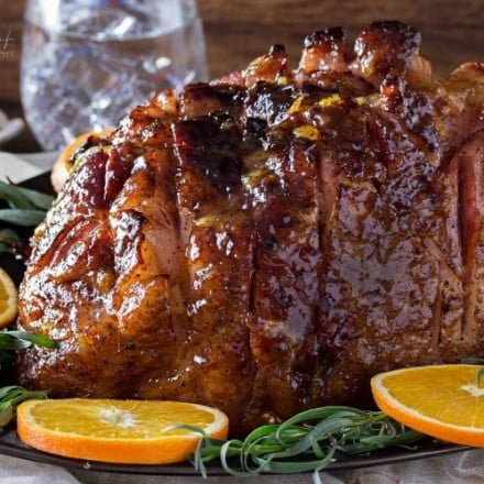 Bourbon Mustard Orange Glazed Ham | Sticky, sweet, tangy, and full of flavor... this bourbon mustard and orange glazed ham is one that you'll be happy to have as the star of your holiday meal! | http://thechunkychef.com