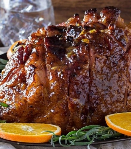 Bourbon Mustard Orange Glazed Ham | Sticky, sweet, tangy, and full of flavor... this bourbon mustard and orange glazed ham is one that you'll be happy to have as the star of your holiday meal! | http://thechunkychef.com