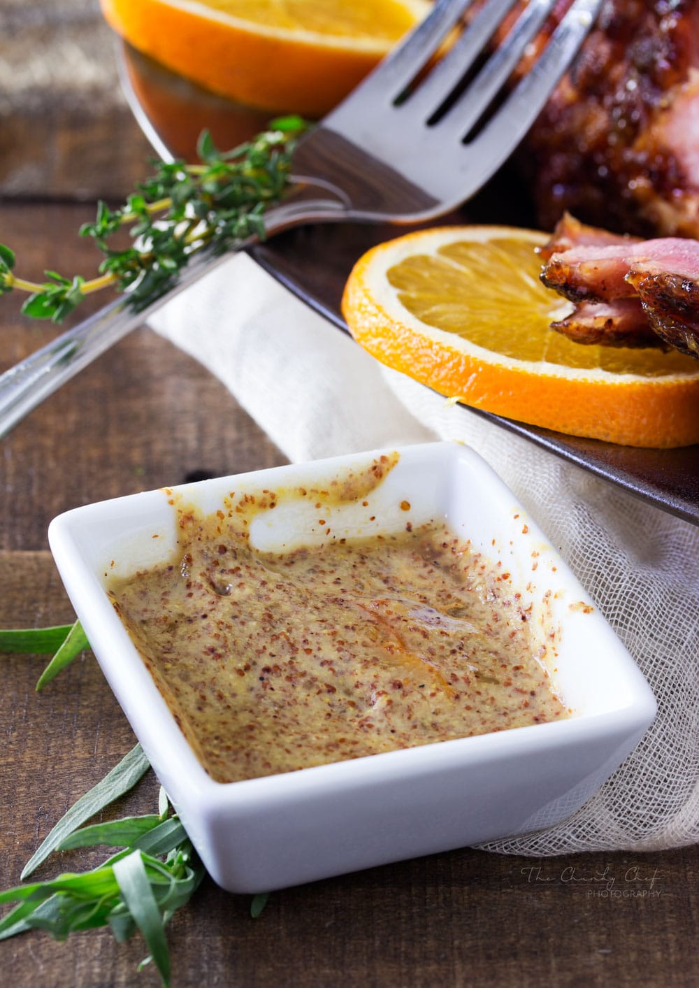 Bourbon Mustard Orange Glazed Ham | Sticky, sweet, tangy, and full of flavor... this bourbon mustard and orange glazed ham is one that you'll be happy to have as the star of your holiday meal! | http://thechunkychef.com