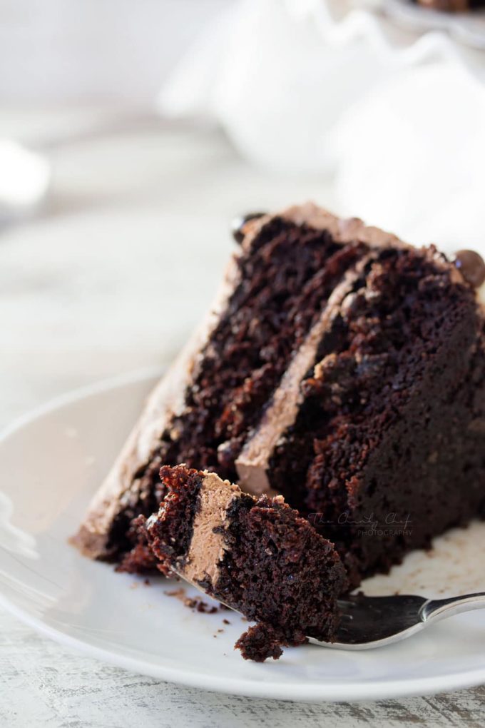 Buttermilk-Chocolate-Layer-Cake | The ULTIMATE soft and fluffy chocolate layer cake. Made from scratch with buttermilk, and slathered in an ultra creamy buttercream frosting! | http://thechunkychef.com