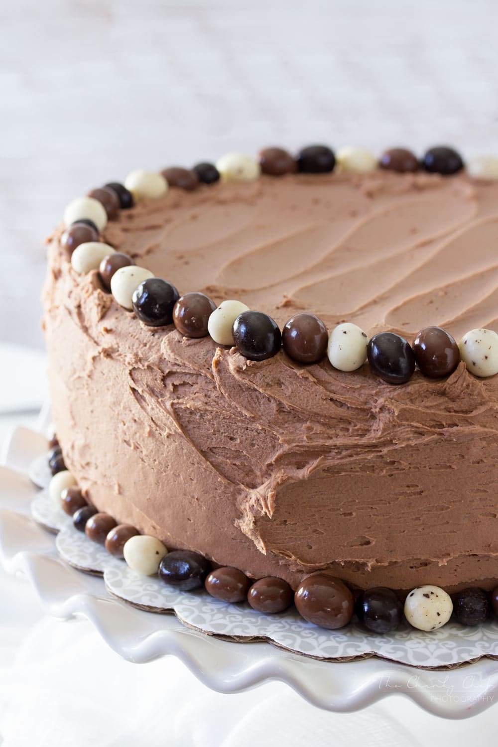 Buttermilk-Chocolate-Layer-Cake | The ULTIMATE soft and fluffy chocolate layer cake. Made from scratch with buttermilk, and slathered in an ultra creamy buttercream frosting! | http://thechunkychef.com