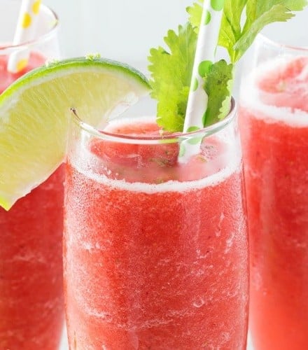 Boozy Strawberry Limeade Slushies | Just 5 ingredients, including ice, and you're on your way to slushy heaven! | http://thechunkychef.com