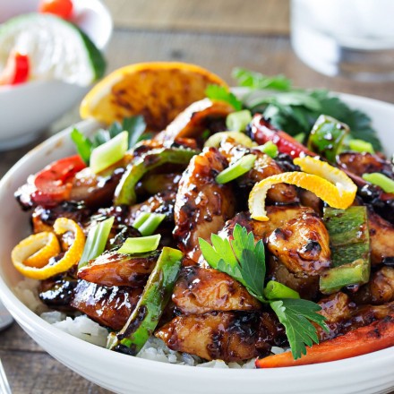 Cajun Honey Glazed Chicken Bowls | This Cajun honey glazed chicken bowl is packed with bright, fresh ingredients! The chicken is actually cooked IN the marinade, allowing for maximum flavor. | http://thechunkychef.com