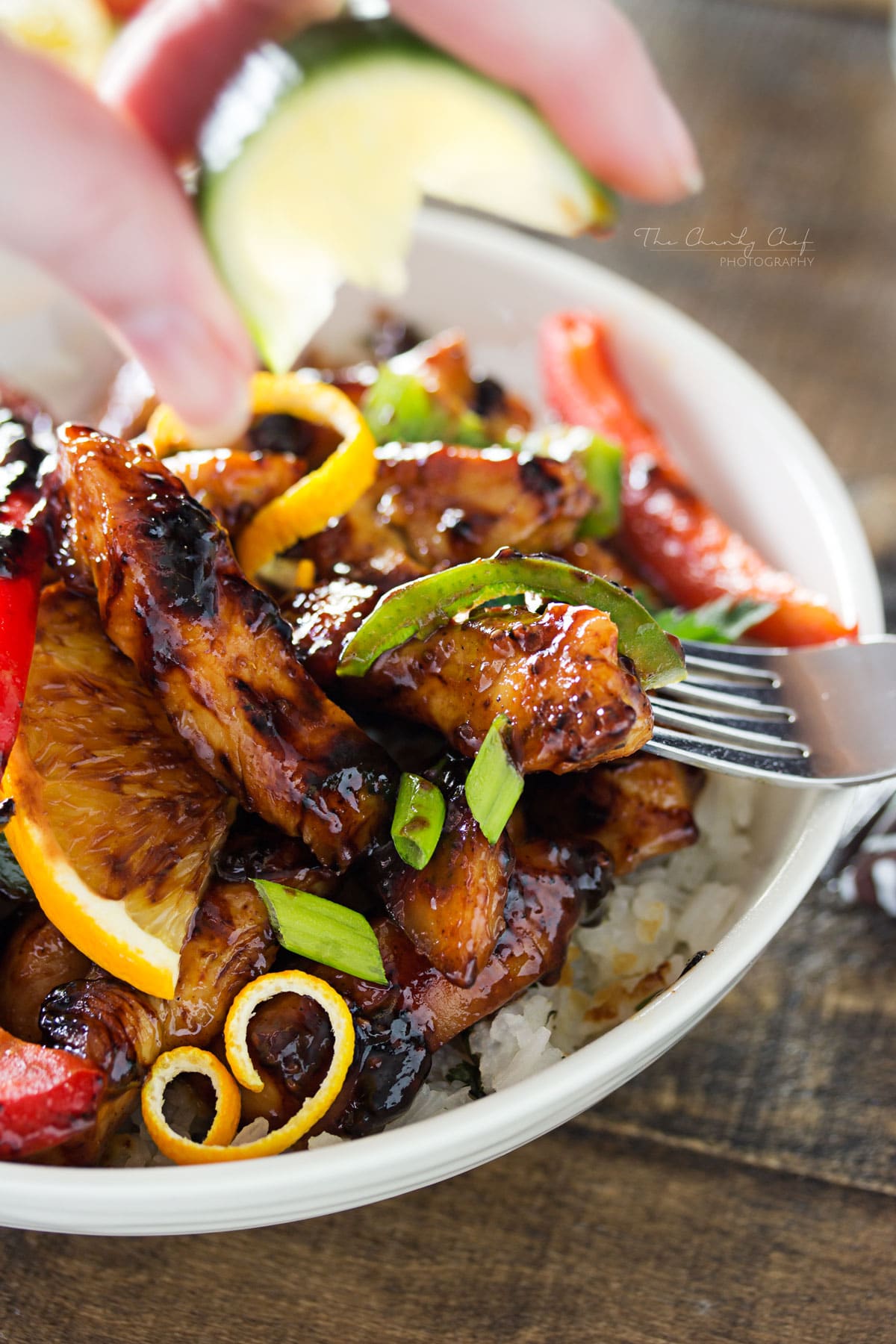 Cajun Honey Glazed Chicken Bowls | This Cajun honey glazed chicken bowl is packed with bright, fresh ingredients! The chicken is actually cooked IN the marinade, allowing for maximum flavor. | http://thechunkychef.com