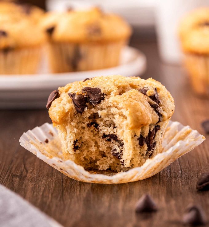 Get ready to toss those boxes of muffin mix, these homemade chocolate chip muffins are moist and tender, loaded with plenty of gooey chocolate, and so simple to make!  Directions for regular, jumbo and mini sized muffins! #muffins #chocolatechip #chocolate #kidfriendly #breakfast #brunch #baking #homemade #scratch #easyrecipe