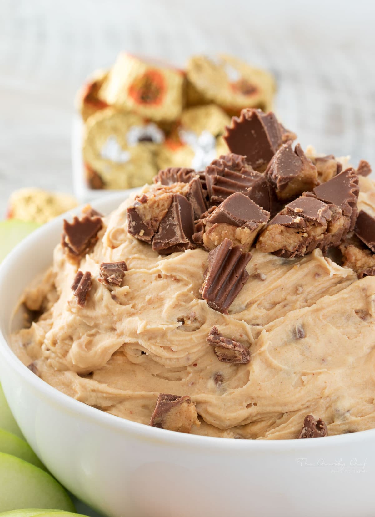 Peanut Butter Cup Cheesecake Dip | Easy to make, this cheesecake dip is loaded with great creamy flavors and pieces of peanut butter cups. Try it with apple slices or vanilla wafers! | http://thechunkychef.com