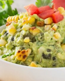 Roasted Poblano Charred Corn Guacamole | Not your average guacamole recipe! Filled with smoky roasted poblano peppers and deliciously charred corn, it's layer after layer of flavor! | http://thechunkychef.com