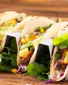 Tequila Lime Chicken Tacos | Tender, juicy, tequila lime chicken is nestled into soft corn tortillas and topped with a smoky sweet grilled pineapple salsa for the most delicious tacos! | http://thechunkychef.com
