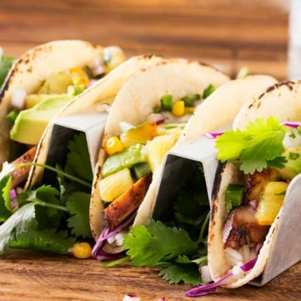 Tequila Lime Chicken Tacos | Tender, juicy, tequila lime chicken is nestled into soft corn tortillas and topped with a smoky sweet grilled pineapple salsa for the most delicious tacos! | http://thechunkychef.com