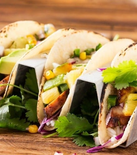 Tequila Lime Chicken Tacos | Tender, juicy, tequila lime chicken is nestled into soft corn tortillas and topped with a smoky sweet grilled pineapple salsa for the most delicious tacos! | http://thechunkychef.com