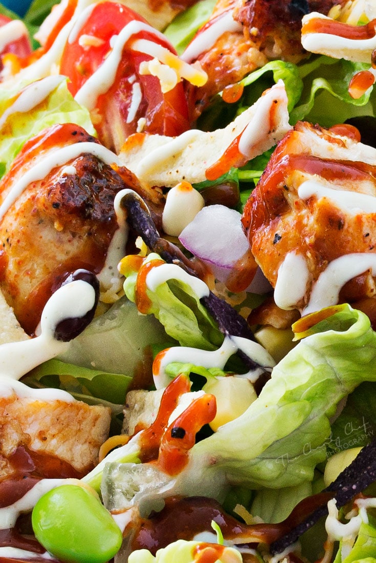 BBQ Chicken Salad | This fresh and crisp bbq chicken salad is packed with veggies, tender grilled chicken, and topped with bbq sauce and a green chile ranch dressing! | http://thechunkychef.com