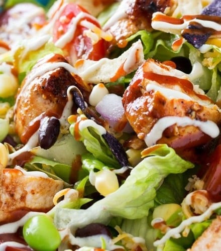 BBQ Chicken Salad | This fresh and crisp bbq chicken salad is packed with veggies, tender grilled chicken, and topped with bbq sauce and a green chile ranch dressing! | http://thechunkychef.com