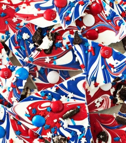 Festive Red White and Blue Bark | This simple and fun no-bake bark recipe is perfect for Memorial Day or Independence Day! So simple, even your kids can make it! | http://thechunkychef.com
