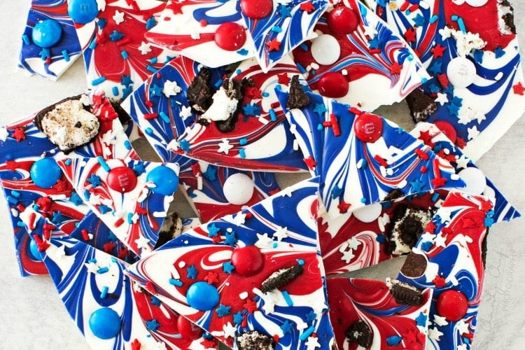 Festive Red White and Blue Bark | This simple and fun no-bake bark recipe is perfect for Memorial Day or Independence Day! So simple, even your kids can make it! | http://thechunkychef.com