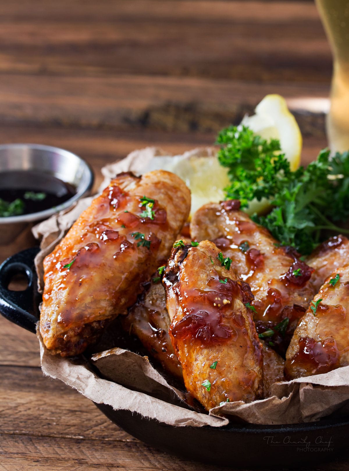 Jack Daniels Glazed Baked Chicken Wings | No need to fry... these baked chicken wings are SUPER crispy! Coated in a flavor-packed copycat Jack Daniels sauce, they're the perfect appetizer! | http://thechunkychef.com