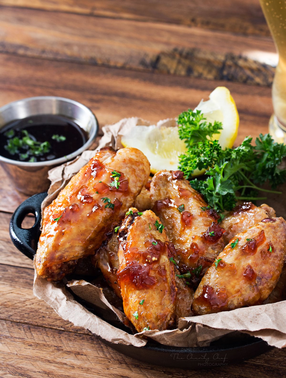 Jack Daniels Glazed Baked Chicken Wings | No need to fry... these baked chicken wings are SUPER crispy! Coated in a flavor-packed copycat Jack Daniels sauce, they're the perfect appetizer! | http://thechunkychef.com