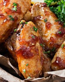 Jack Daniels Glazed Baked Chicken Wings | No need to fry... these baked chicken wings are SUPER crispy! Coated in a flavor-packed copycat Jack Daniels sauce, they're the perfect appetizer! | http://thechunkychef.com