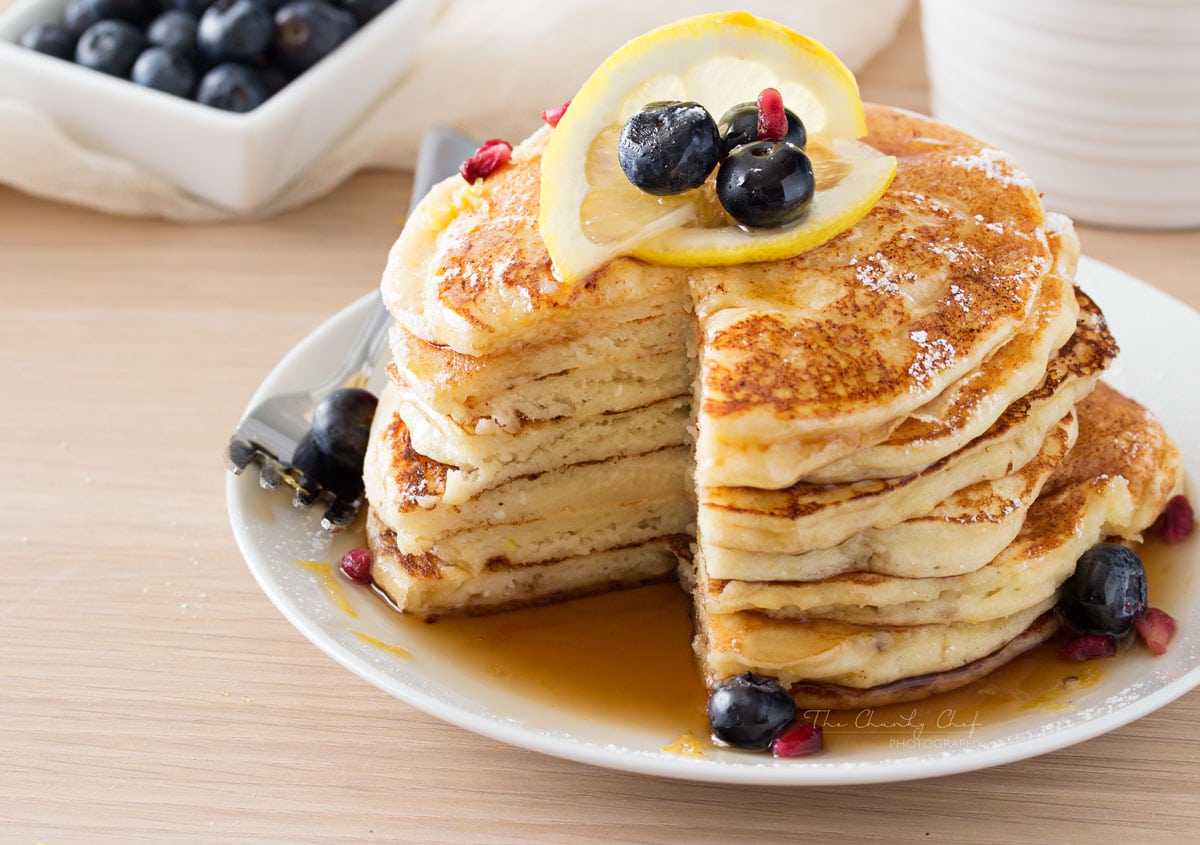 Lemon Ricotta Pancakes | Soft and fluffy ricotta pancakes infused with great lemon zest flavor... perfect for a special occasion breakfast, but easy enough to make every day! | http://thechunkychef.com