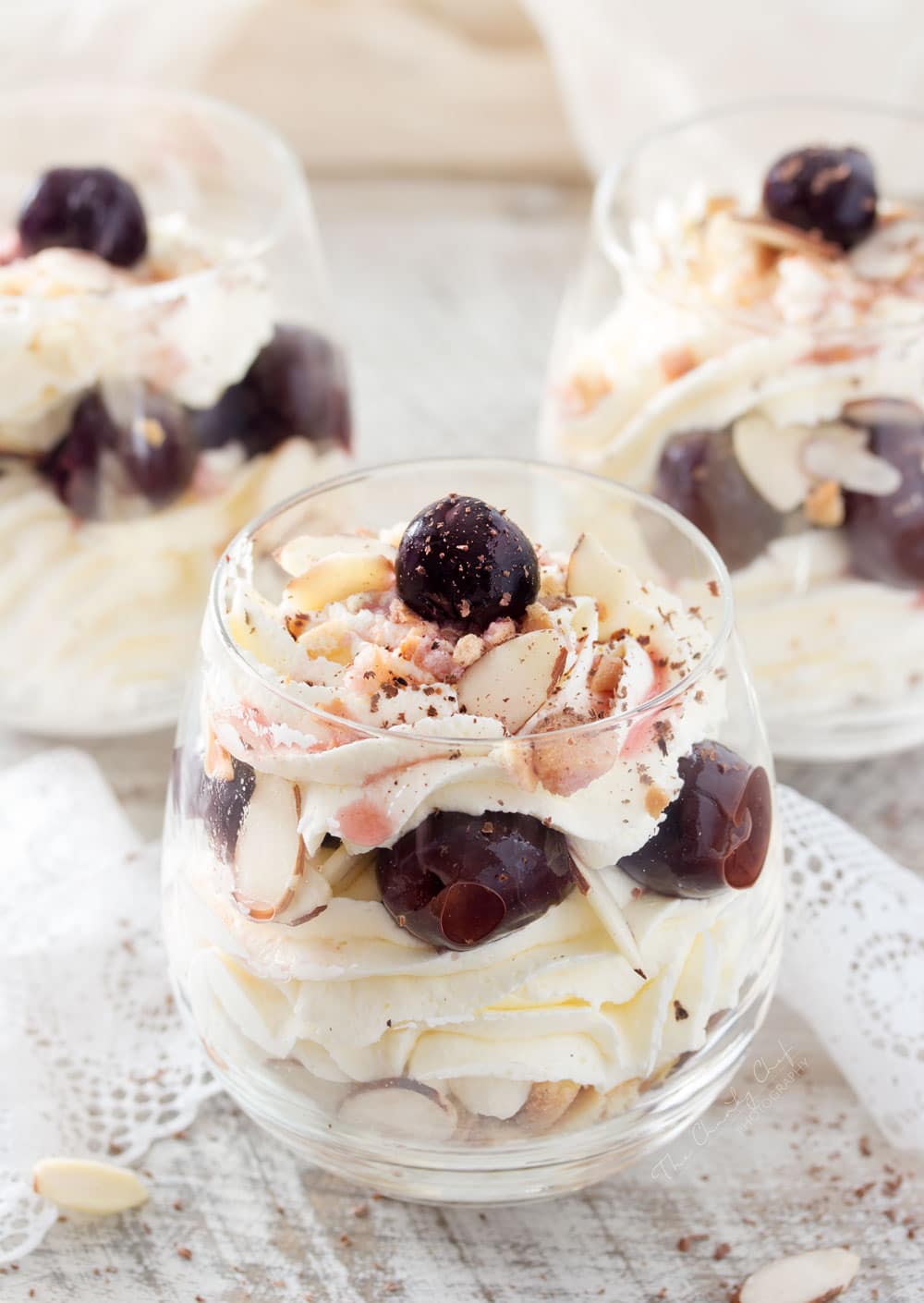 No Bake Cherry Cheesecake Parfaits | For a fast and easy no bake dessert, try these sweet cherry cheesecake parfaits! Ready in about 15 minutes, it's a great last minute dessert idea! | http://thechunkychef.com