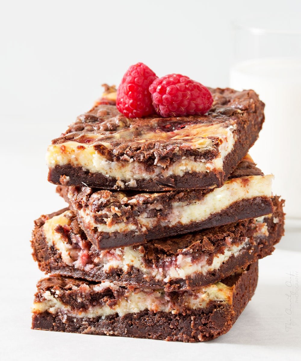 Raspberry Cheesecake Brownies | Rich, fudgy brownies are topped with a creamy cheesecake layer that's been swirled with sweet raspberry jam. The best cheesecake brownies! |http://thechunkychef.com