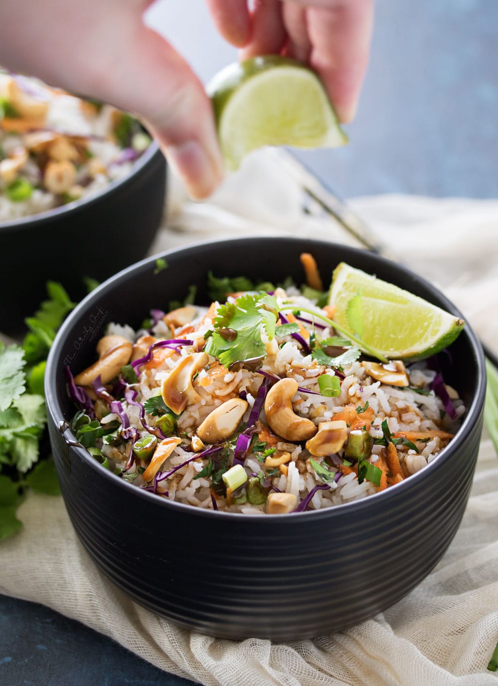 Thai Coconut Cashew Rice | This unique rice side dish is packed with Thai flavors and is a mouthwatering side dish to accompany just about any protein you'd like! | http://thechunkychef.com