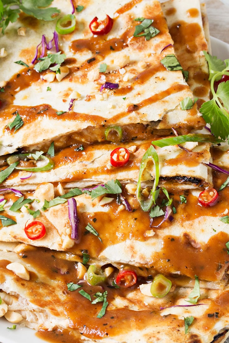 Thai Peanut Chicken Quesadillas | Thai chicken gets a fusion twist in these Thai peanut chicken quesadillas! Loaded with flavor and fun to make, try them tonight! | http://thechunkychef.com